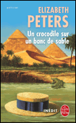 Un crocodile sur un banc de sable